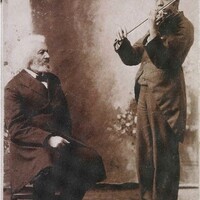 Frederick Douglass with man playing a violin, October 31, 1894